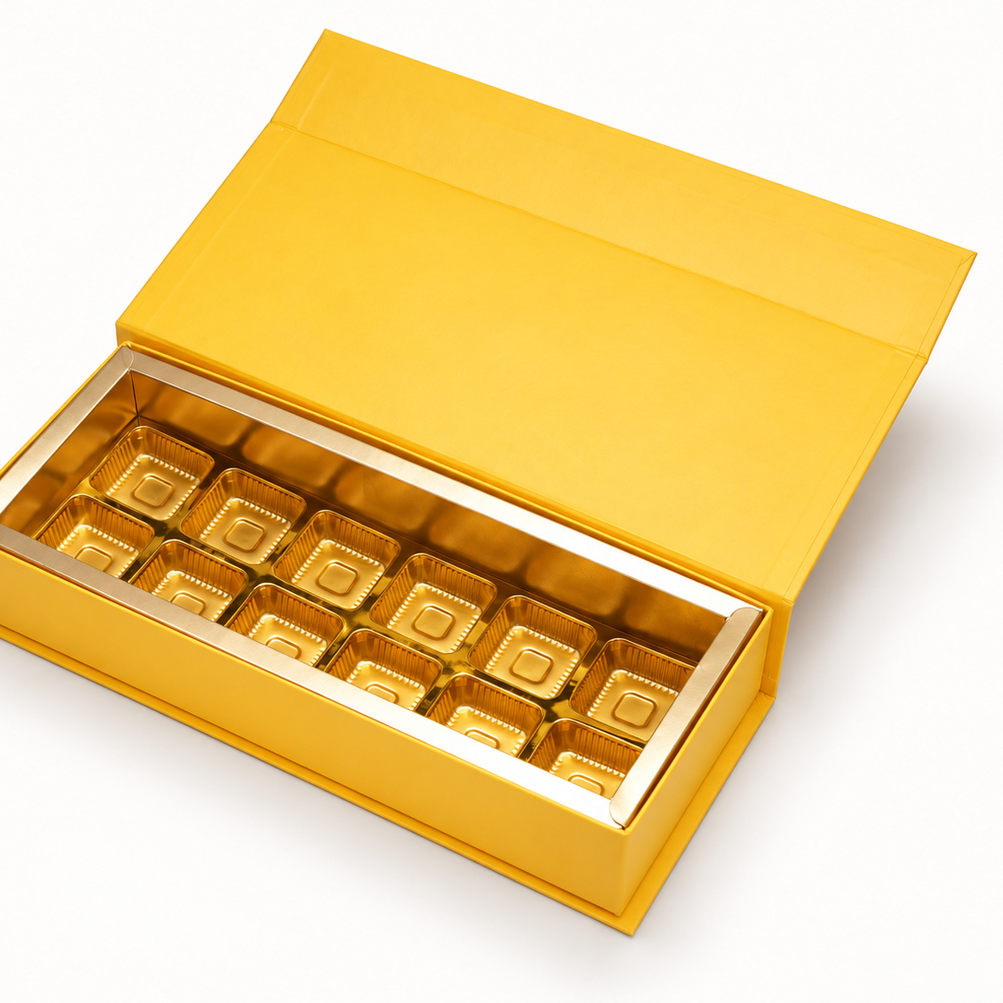 Cropped detail of the yellow & gold twelve-cavity chocolate box.