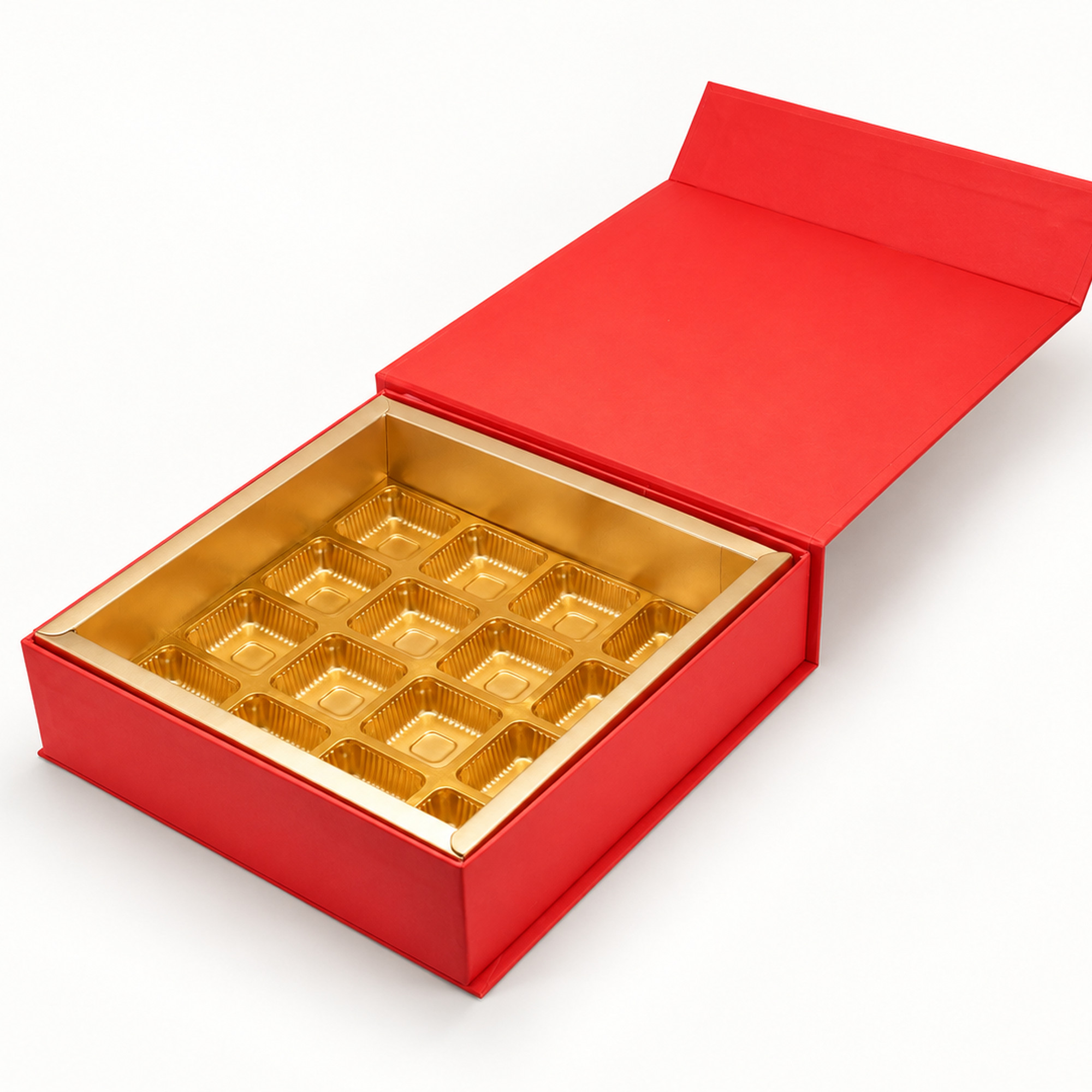 Detail of the red & gold leaf square chocolate gift box showing the gold-coloured insert.