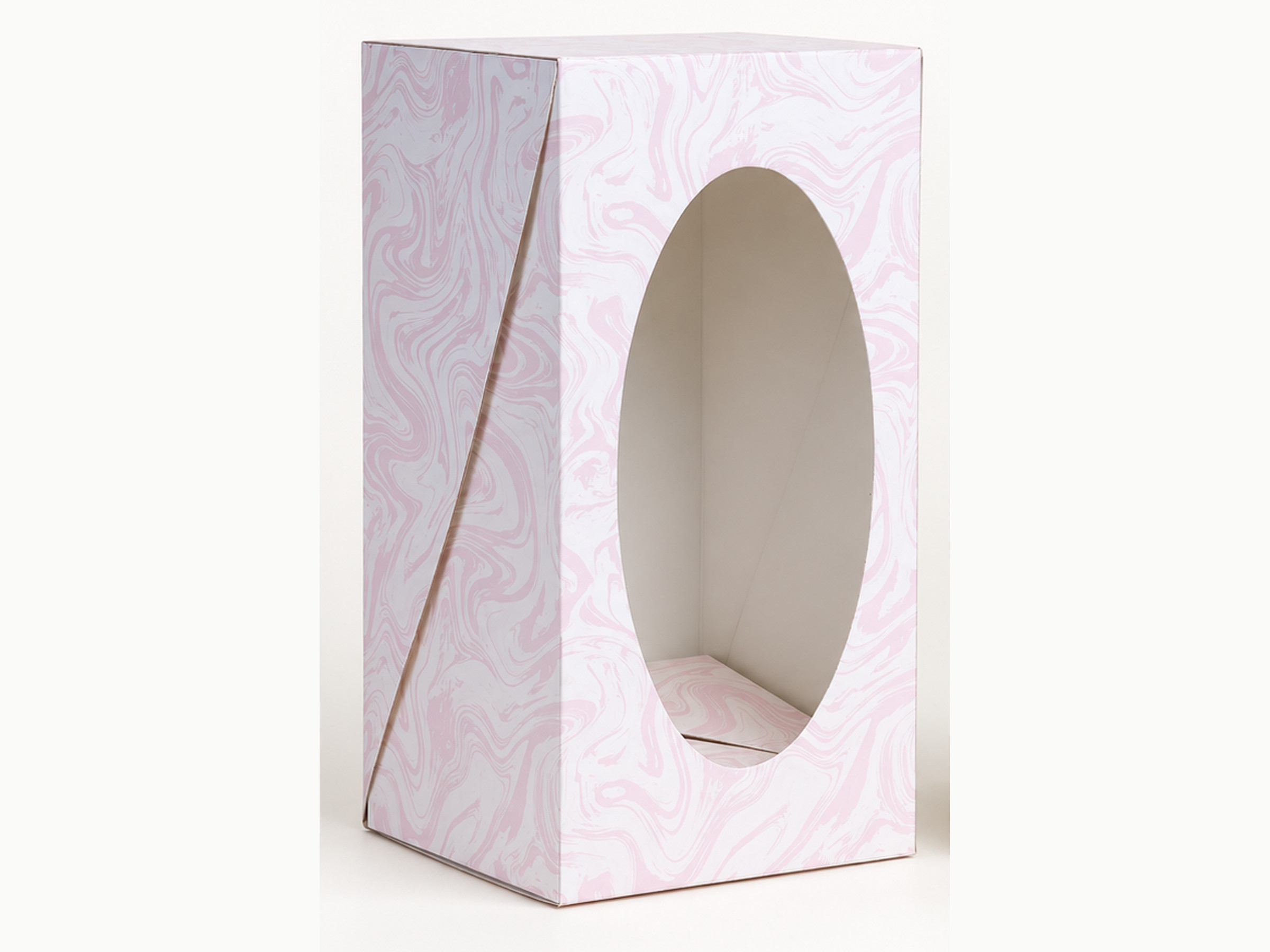 Blush Pink upright swirl-pattern gift box with a large oval window.