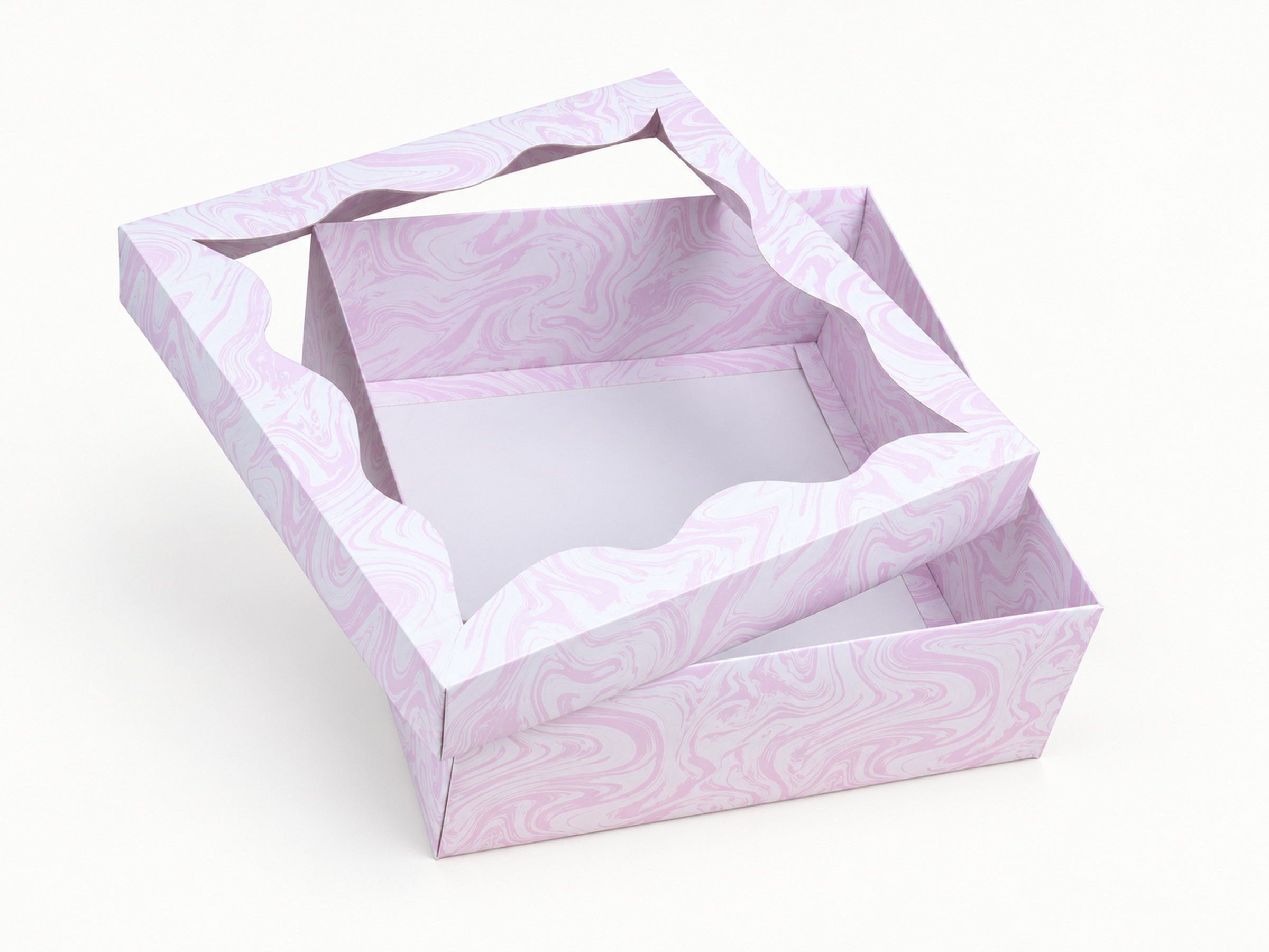 Blush pink and ivory swirl gift box with a scalloped window lid lifted above the open base.