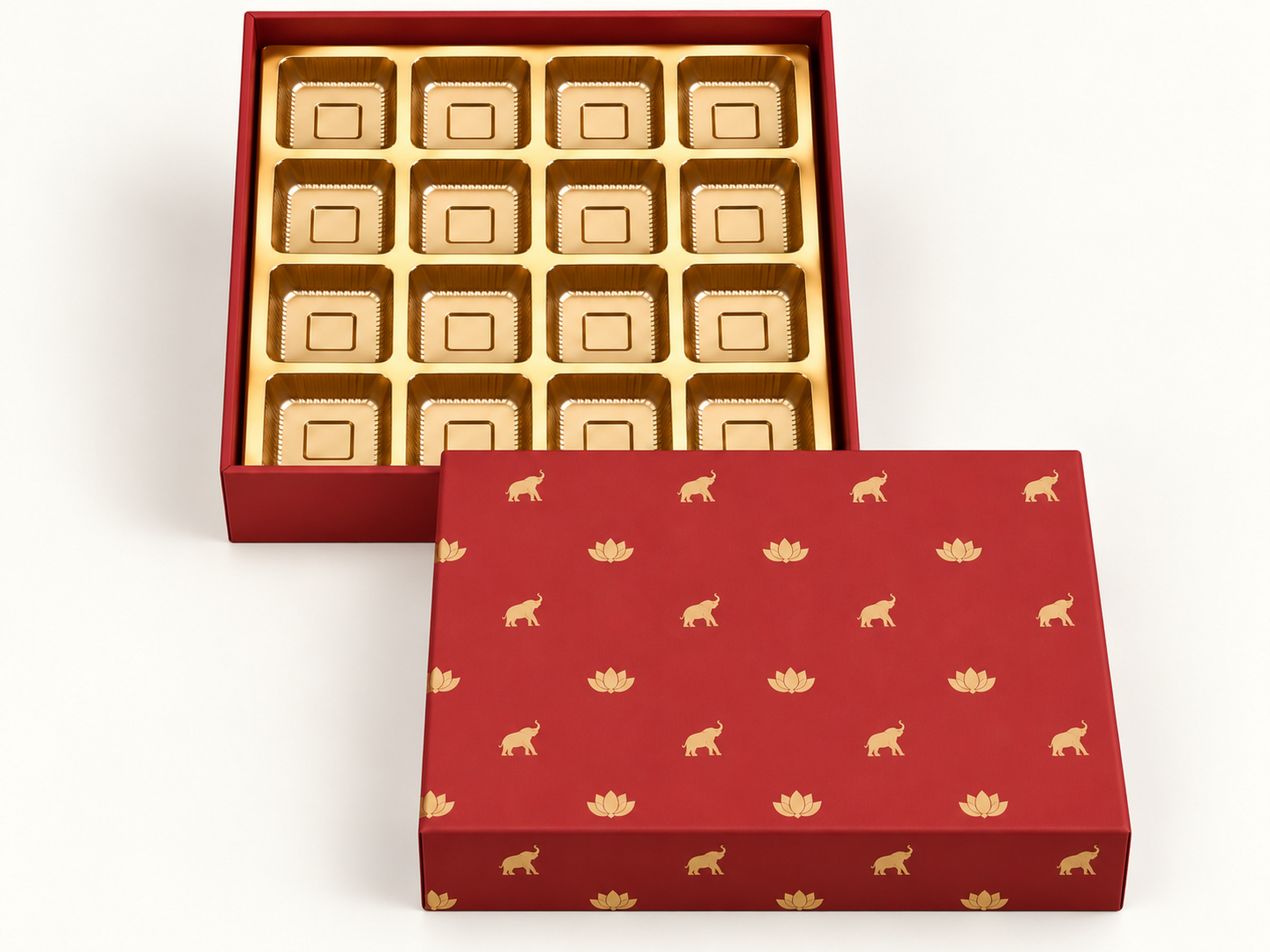 Red sweet box with gold-coloured elephant and lotus motifs, detached lid and a sixteen-cavity gold-coloured insert.