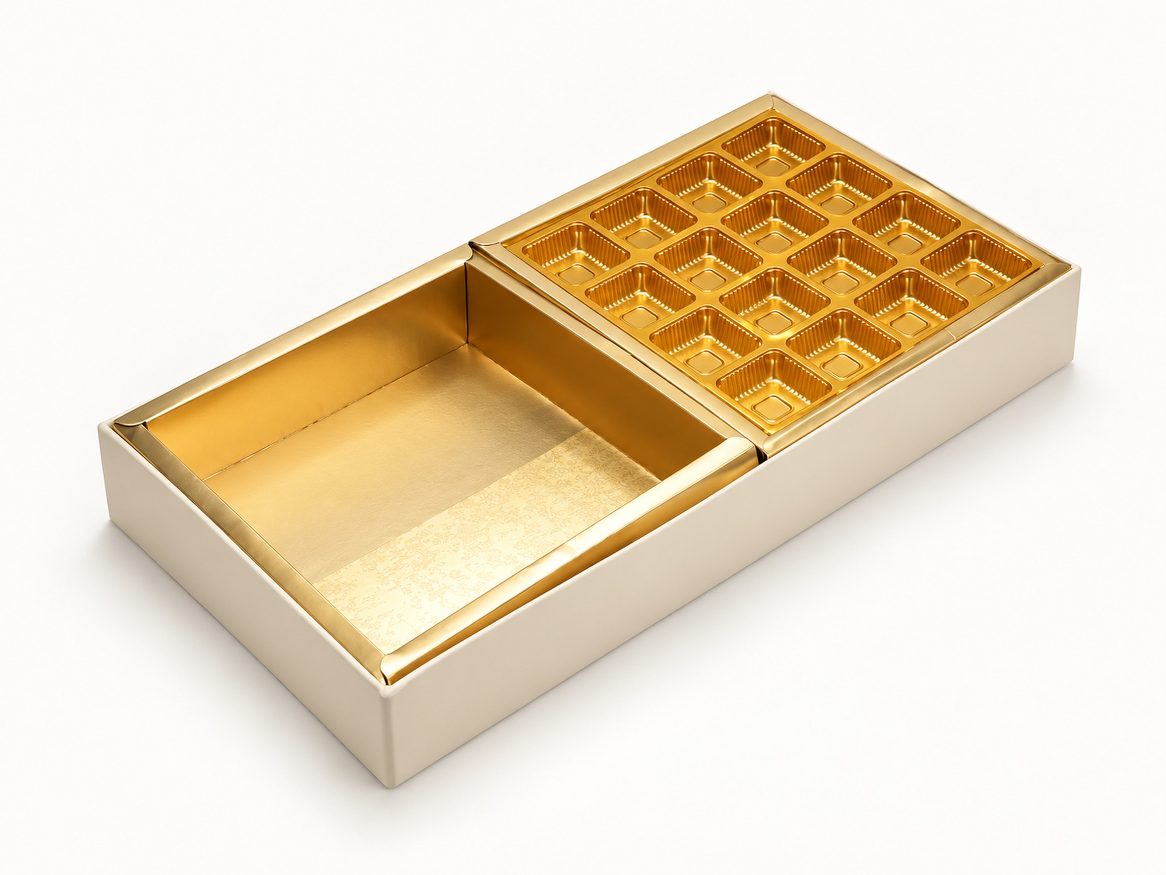 Inside view of the ivory gift box with gold-coloured lining, one large section and sixteen gold insert cavities in a four-by-four layout.