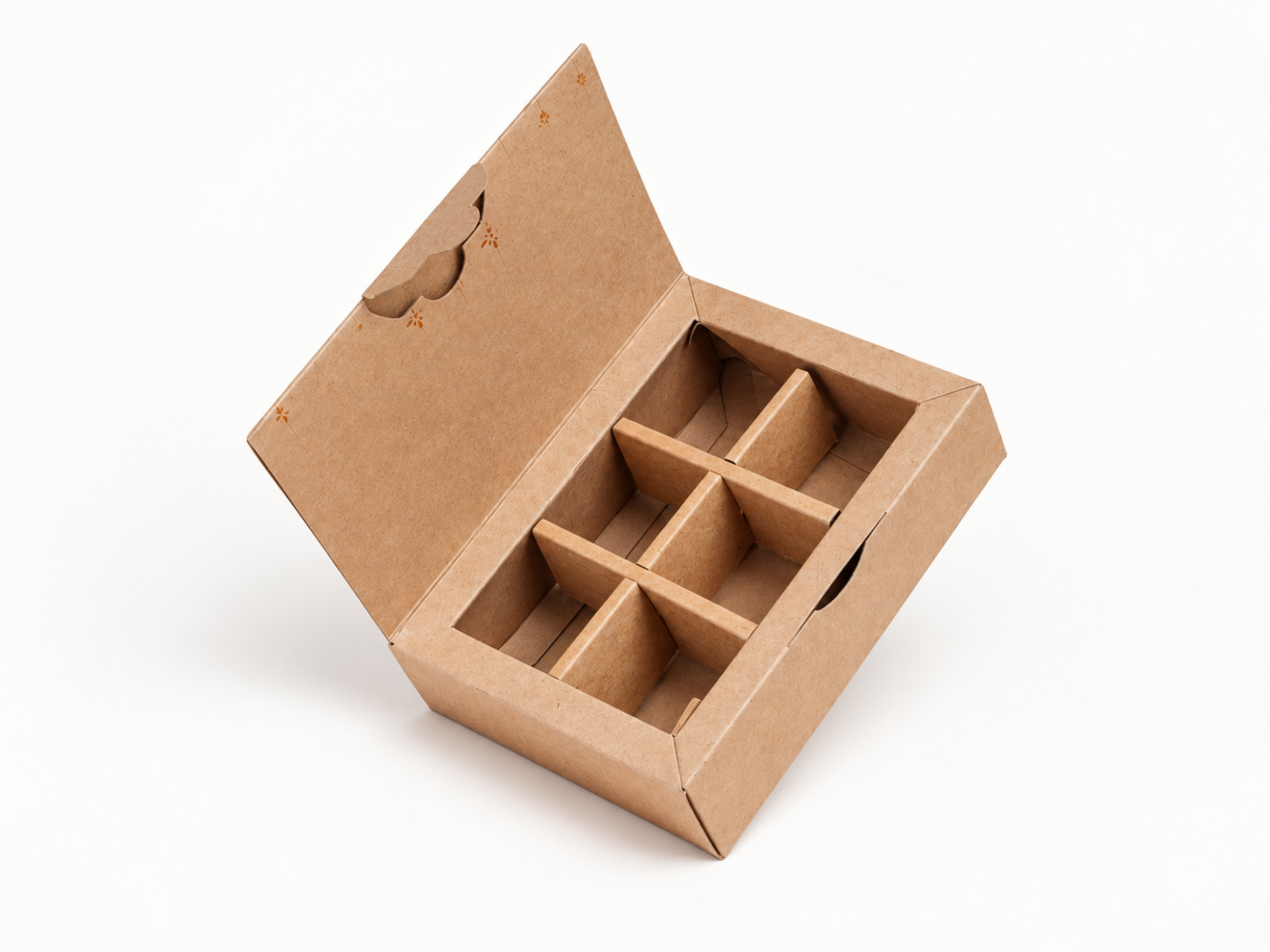 Open kraft gift box with six compartments and small gold motifs on its flap lid.