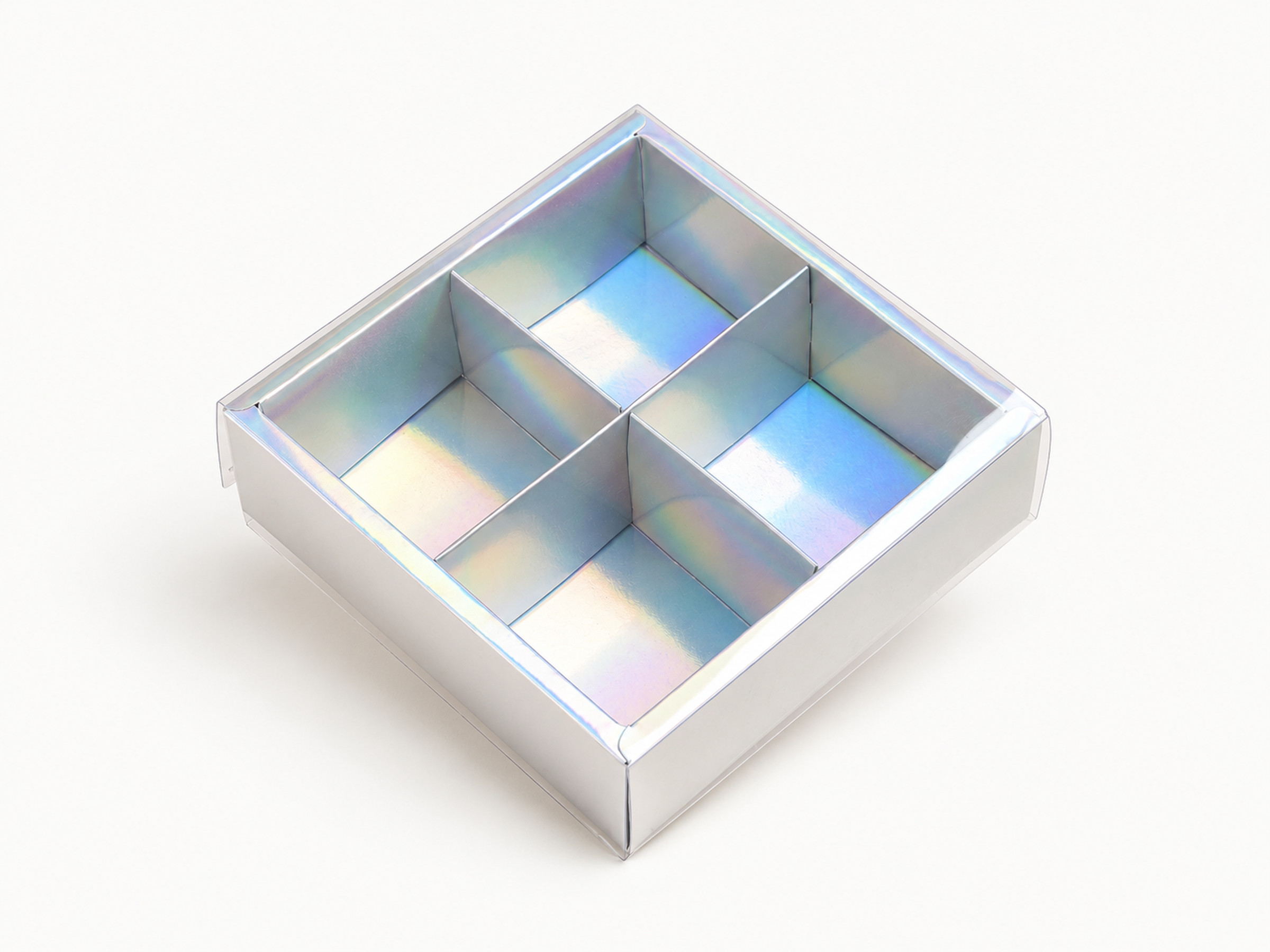 Iridescent square gift box with four compartments beneath a clear cover, shown from above at an angle.