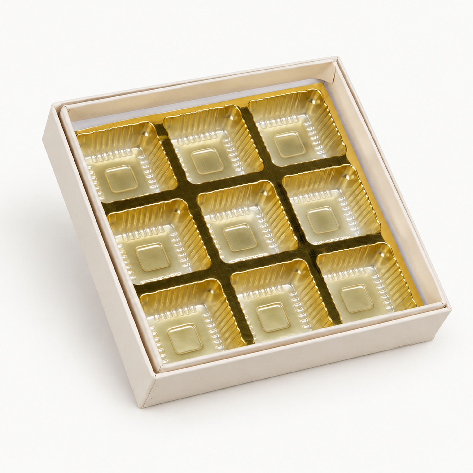 Cropped detail of the ivory nine-cavity chocolate box.