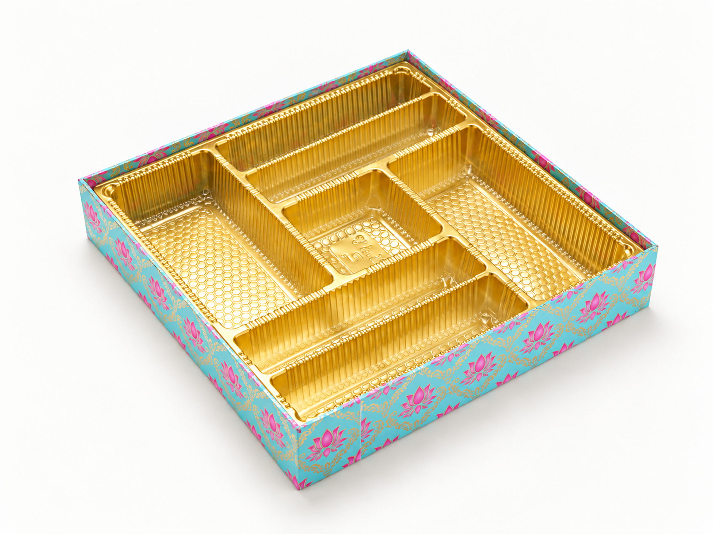 Open turquoise gift box with pink lotus motifs and a gold-coloured compartment tray.