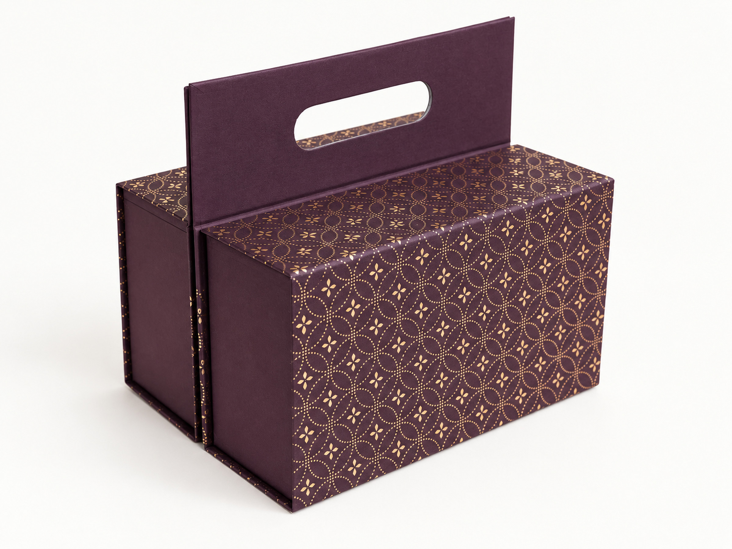 Plum gift box with a gold dotted lattice pattern and an upright cut-out carry handle.