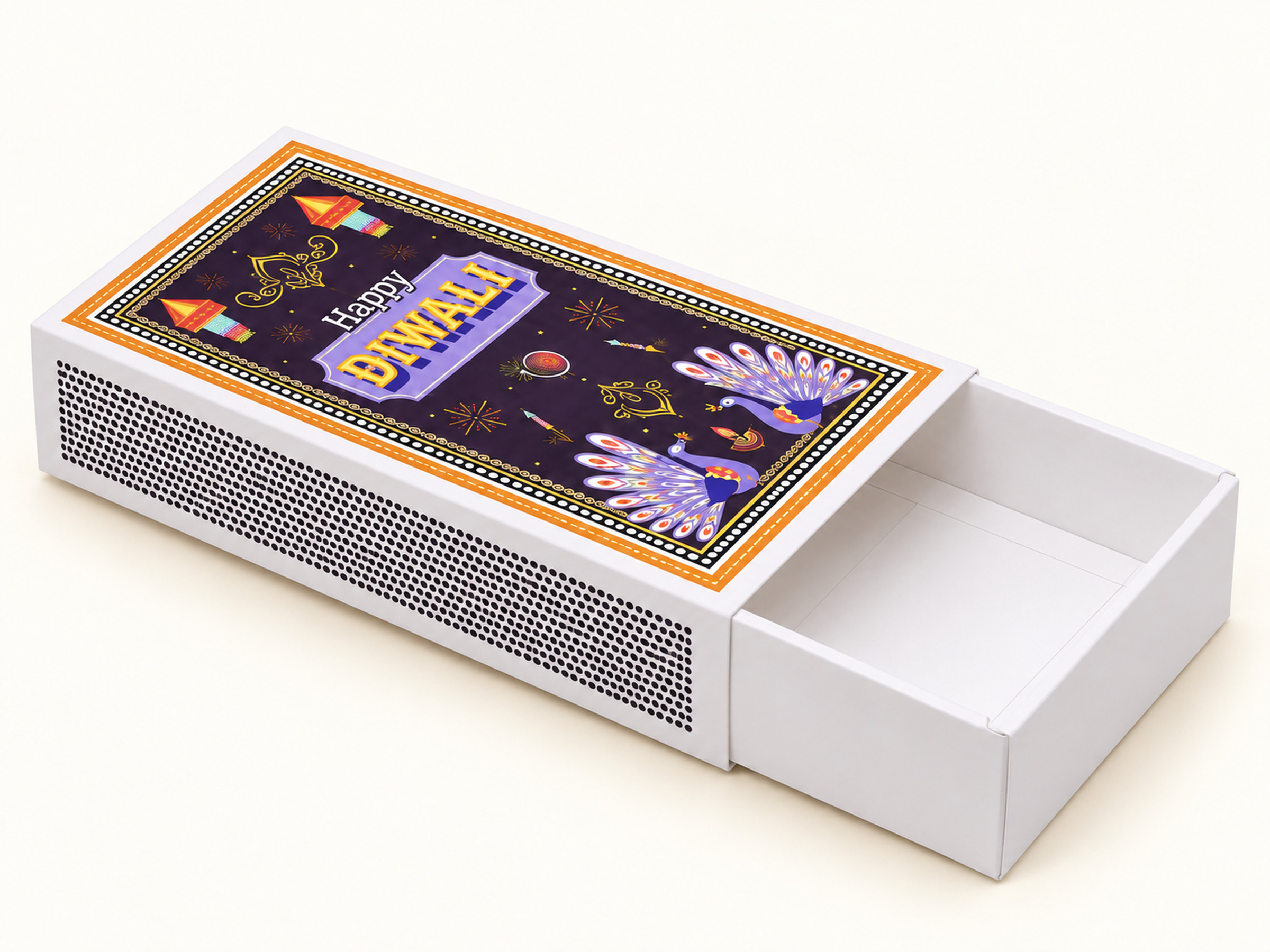 White drawer gift box with dark peacock Diwali artwork and its empty white tray partially pulled out.