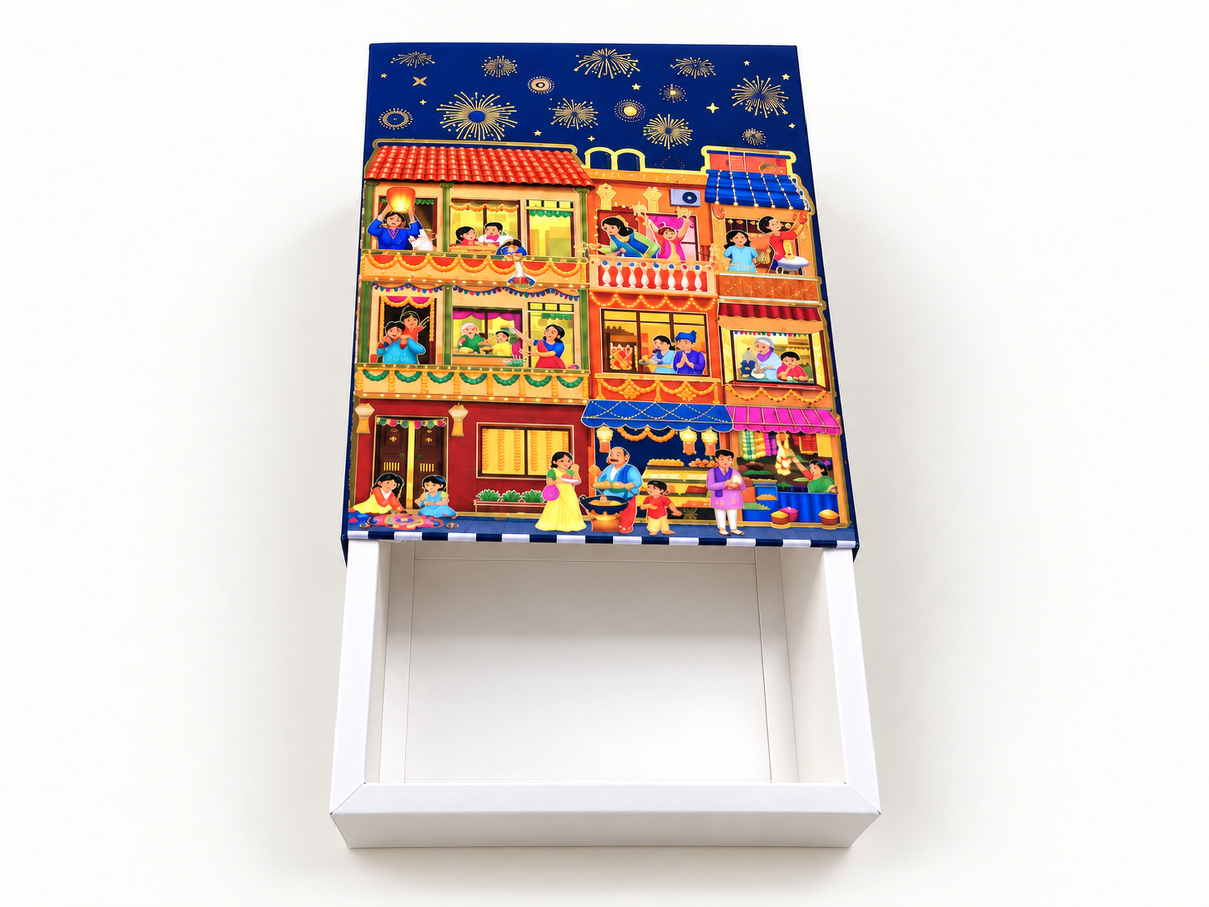 Navy Diwali street-scene sleeve box with colourful illustrated buildings and an empty white tray pulled out.