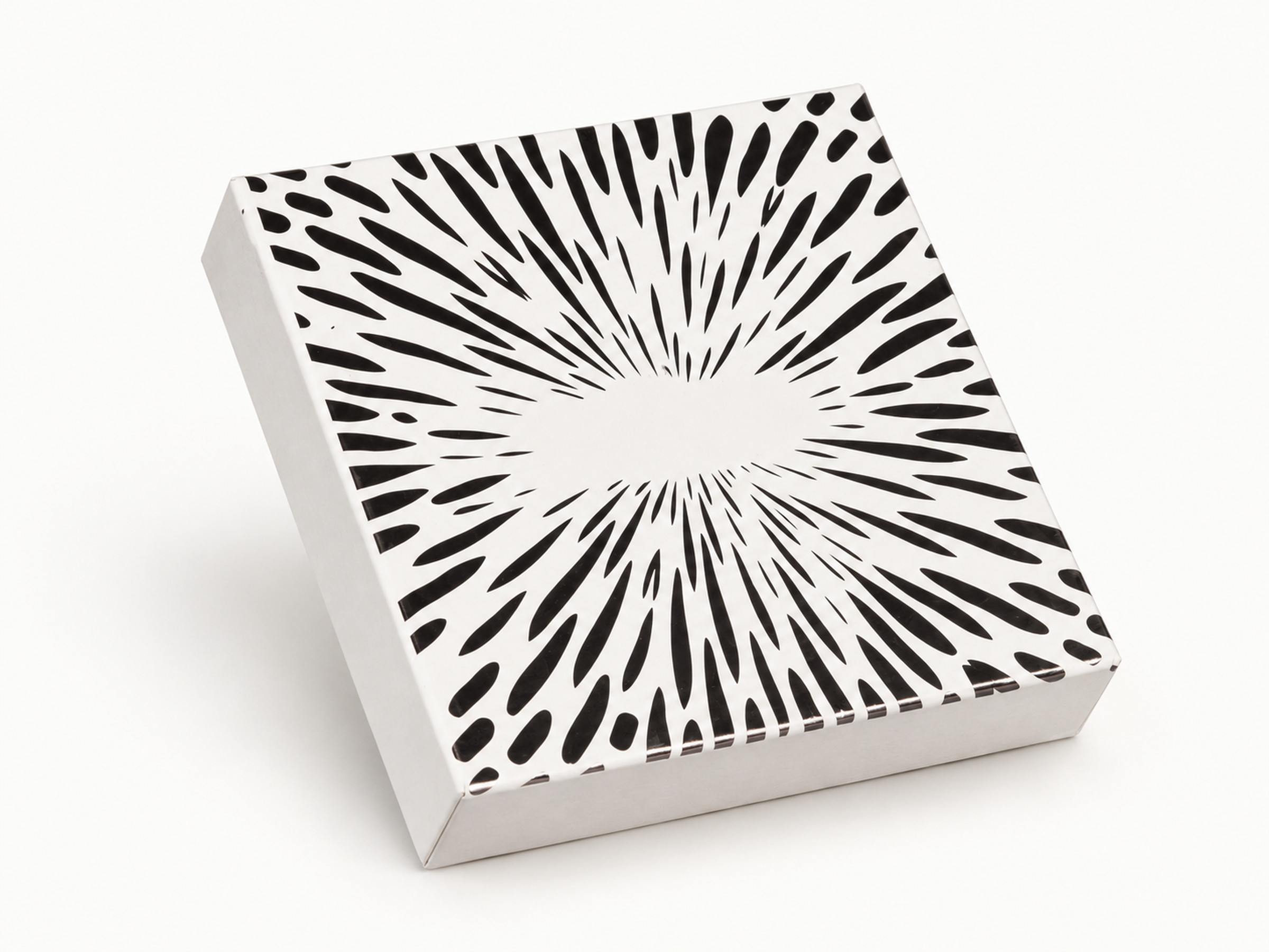 White gift box with a black radial dash pattern across its lid, shown at a three-quarter angle.