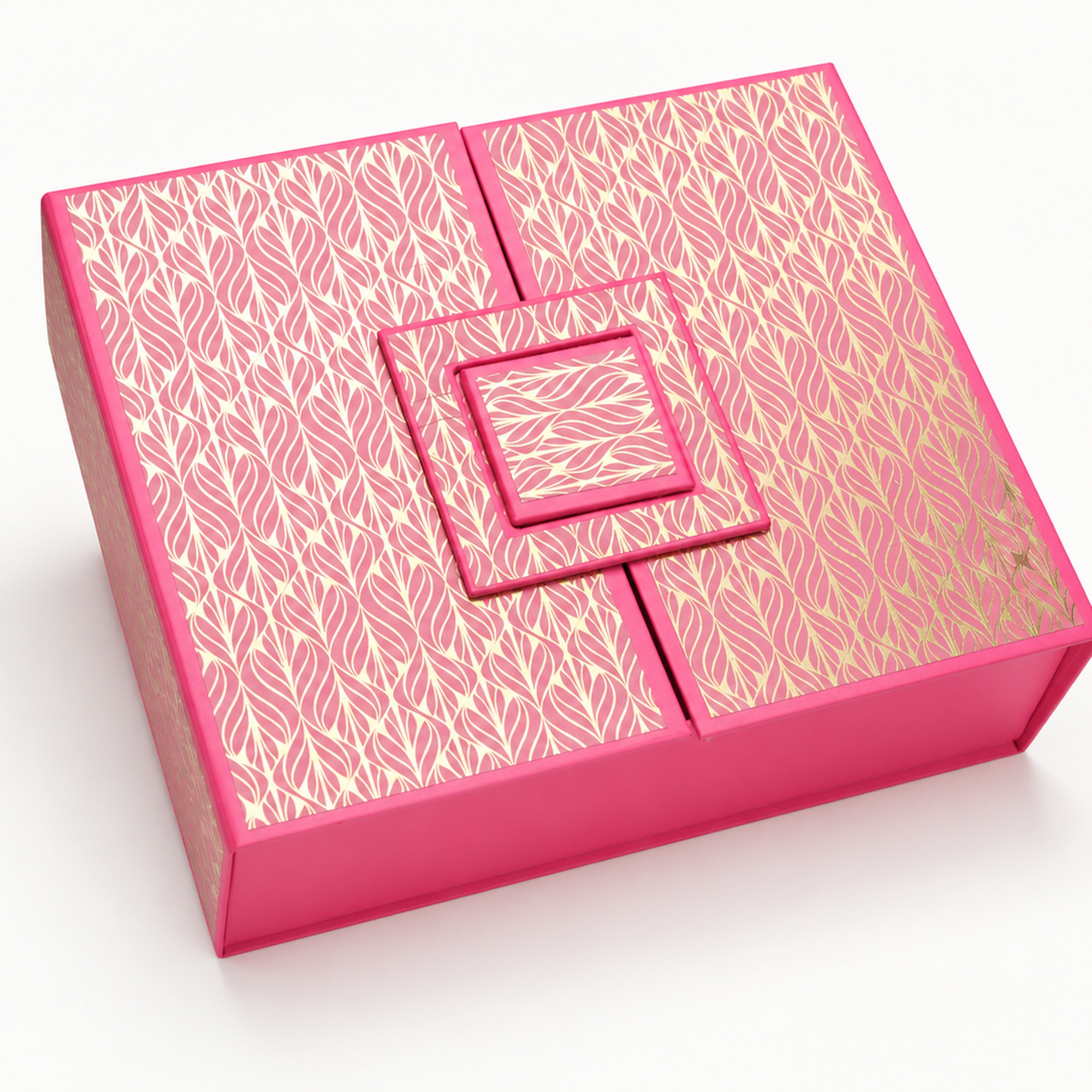 Detail of the pink & gold leaf double-door gift box showing the layered square decorative closure and gold leaf pattern.