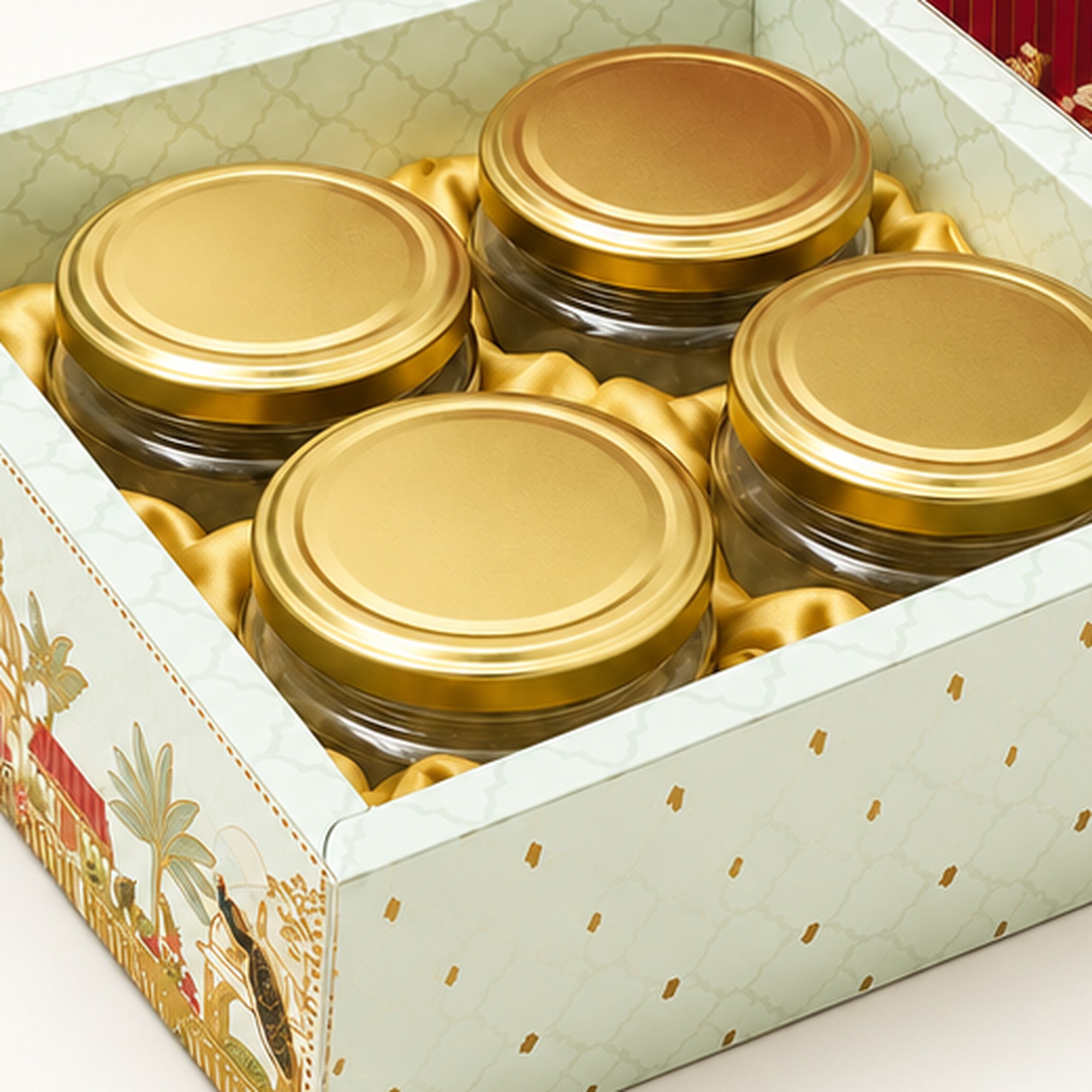 Close-up of gold-lidded jars nestled in gold satin lining.