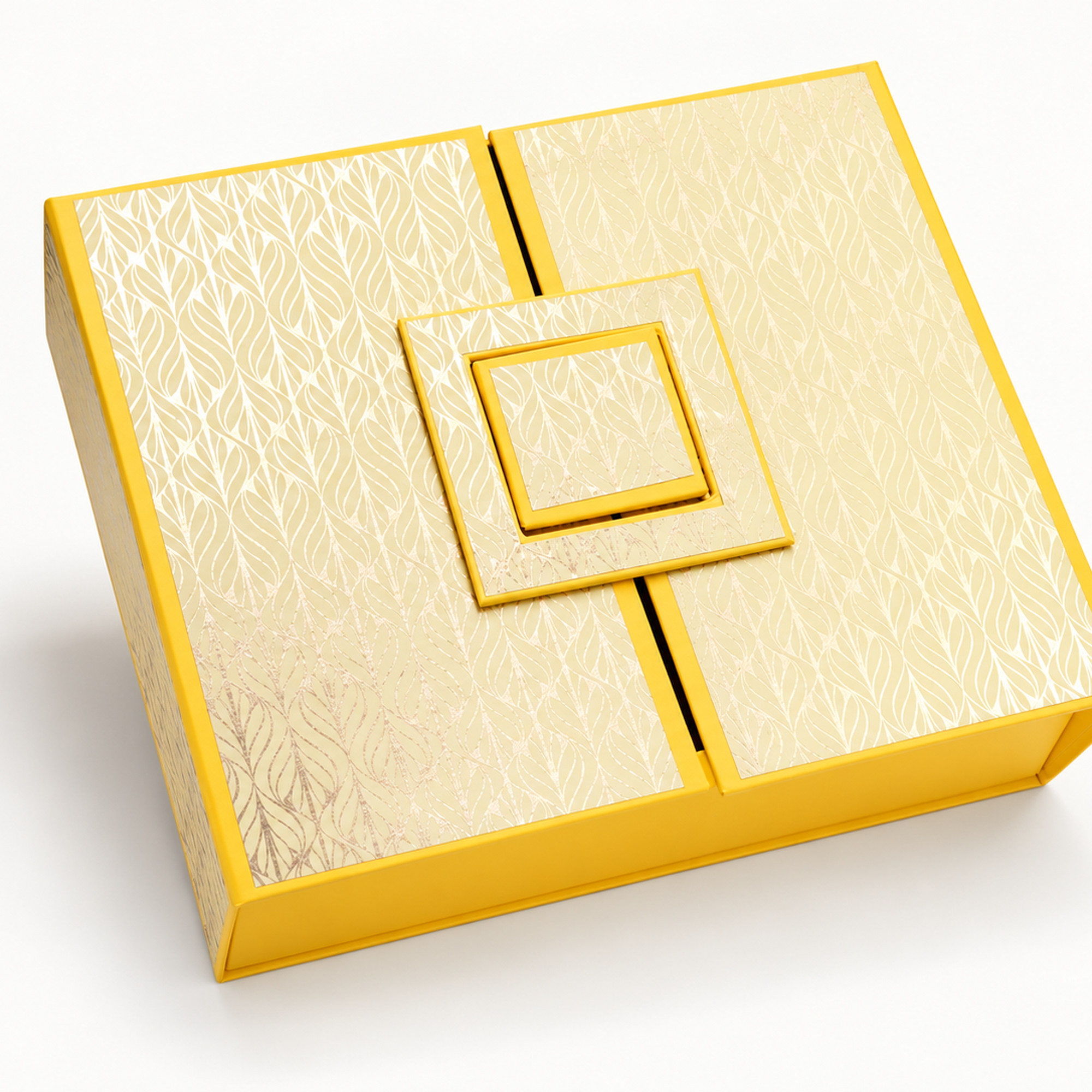 Detail of the yellow & gold leaf double-door gift box showing the layered square decorative closure and gold leaf pattern.