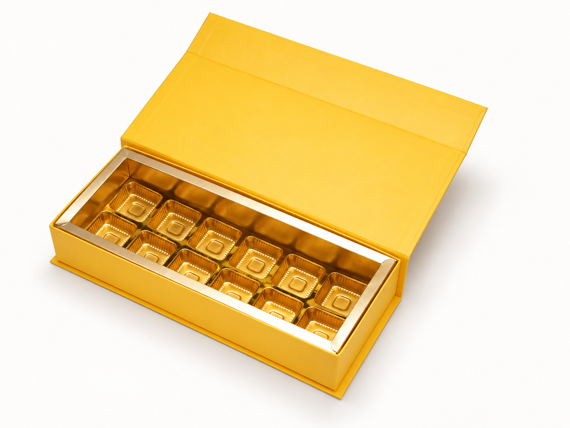 Open yellow rectangular chocolate box with a gold-coloured twelve-cavity insert and raised yellow lid.