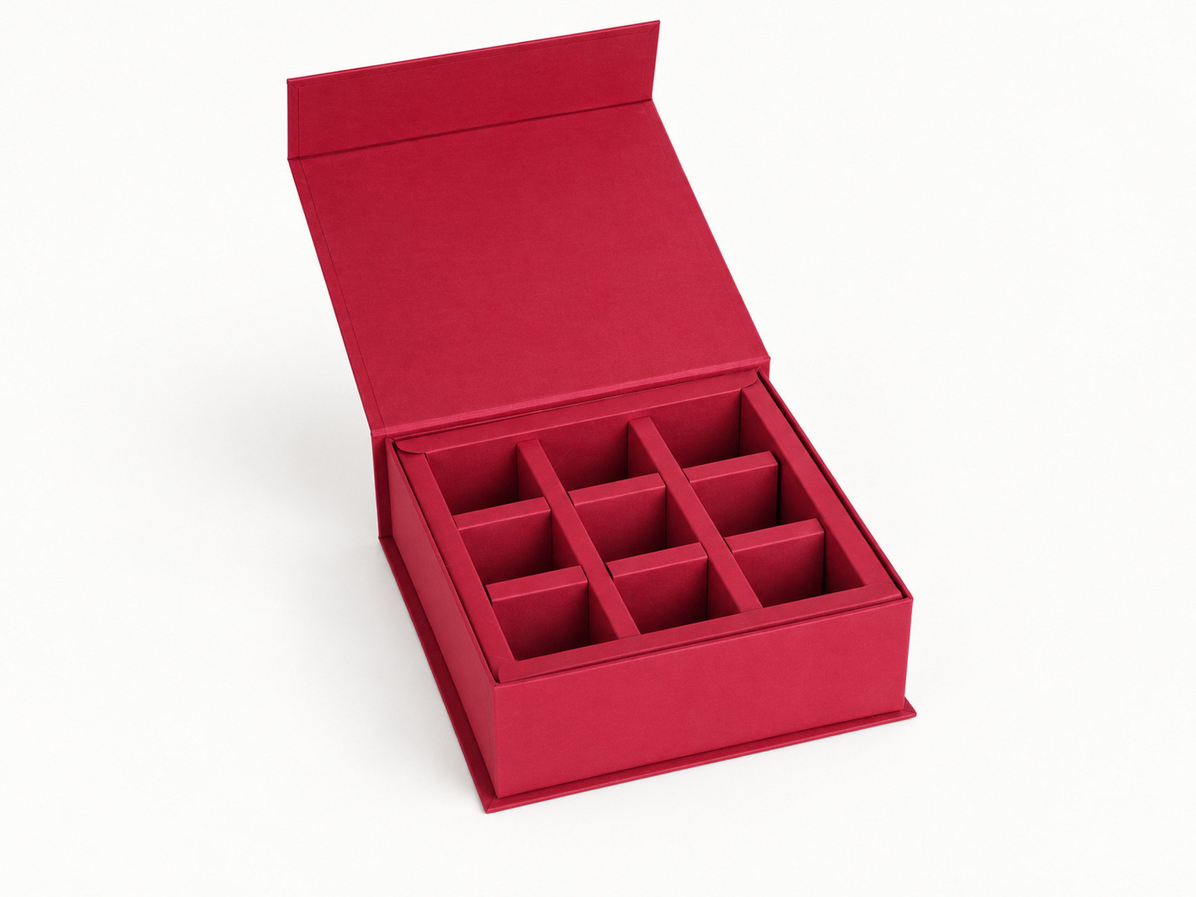 Open burgundy gift box with nine compartments in a three-by-three grid and a raised flap lid.