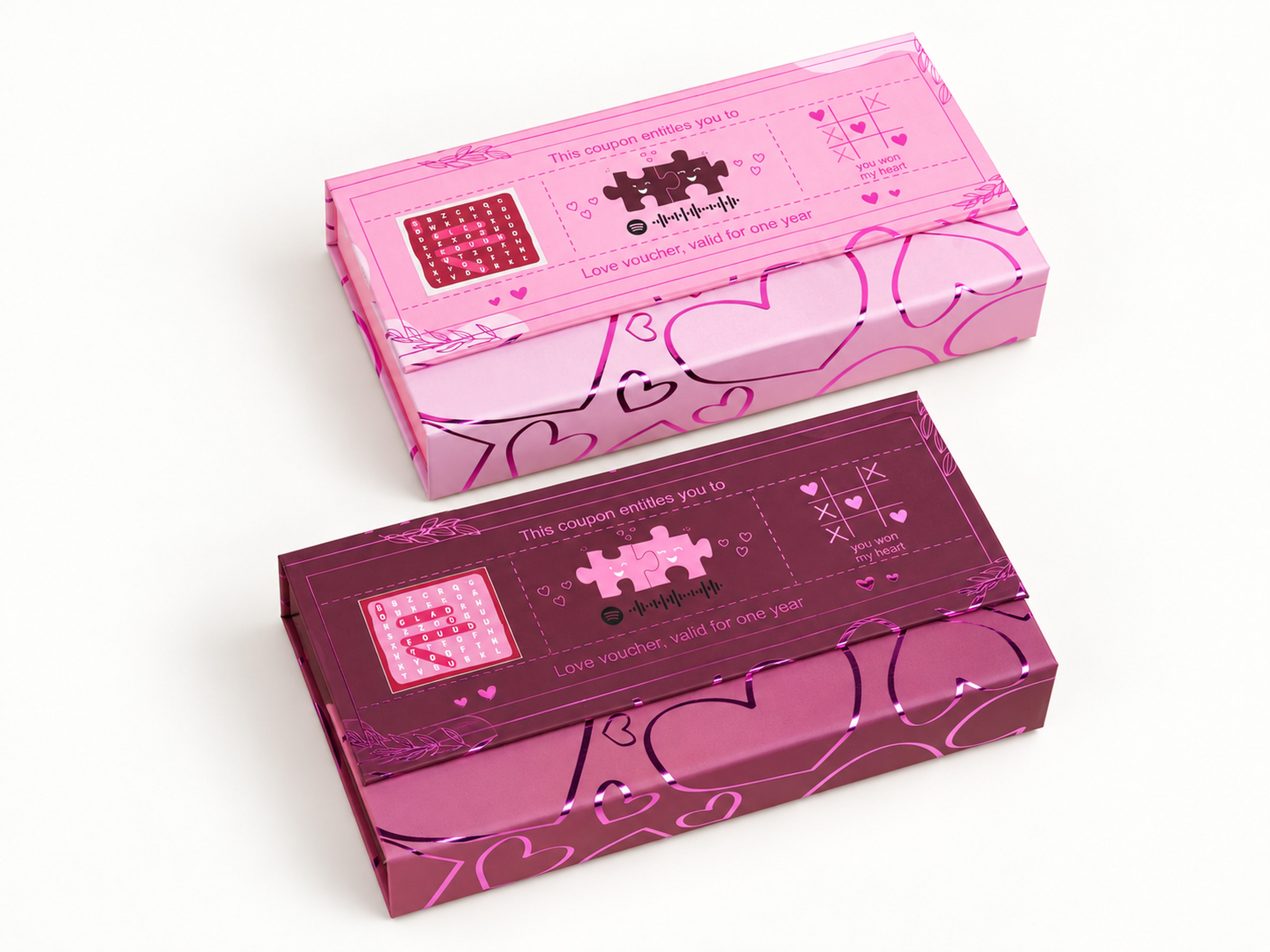 Pink and burgundy rectangular gift boxes with heart motifs and printed love-note artwork, shown together.